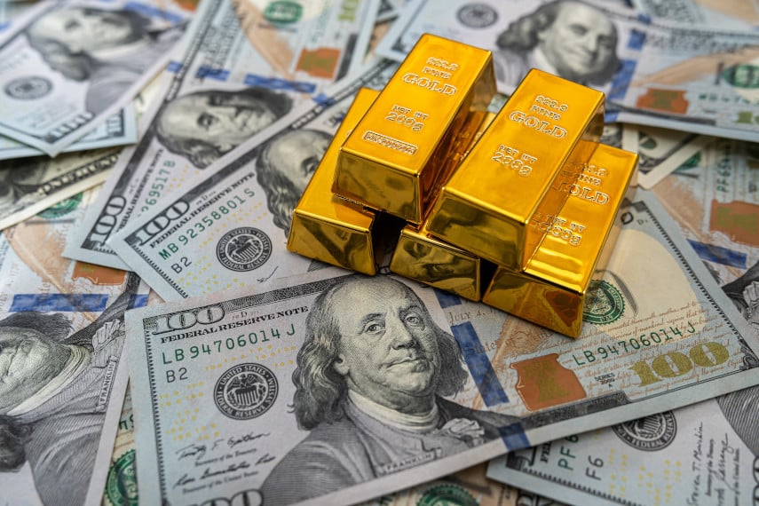 gold and $100 bills