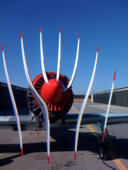Rolling-shutter photograph of a spinning airplane propeller