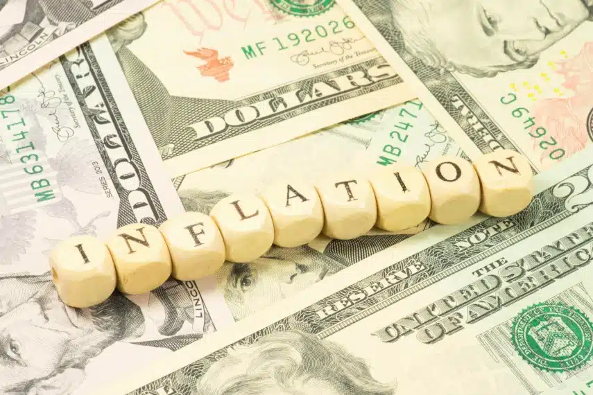 inflation on background of US dollar bills